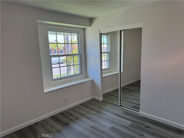 5781 Lime Ave, Cypress, CA 90630 - unfurnished bedroom with a closet and wood finished floors