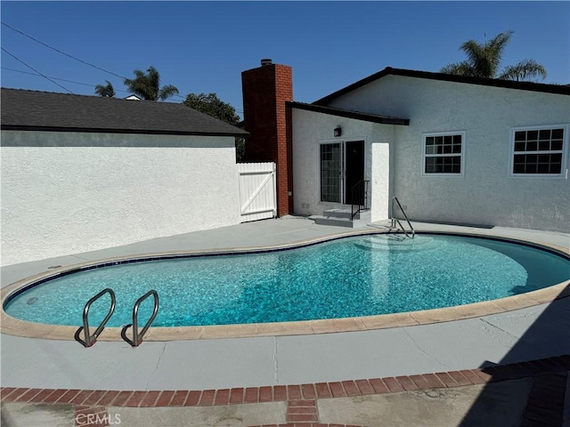 5781 Lime Ave, Cypress, CA 90630 - swimming pool featuring a gate and a patio area