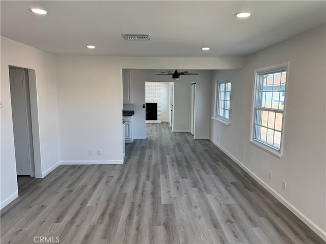 5781 Lime Ave, Cypress, CA 90630 - unfurnished living room featuring recessed lighting, light wood-style floors, and a ceiling fan
