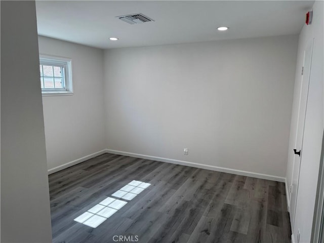 5781 Lime Ave, Cypress, CA 90630 - spare room with wood finished floors and recessed lighting