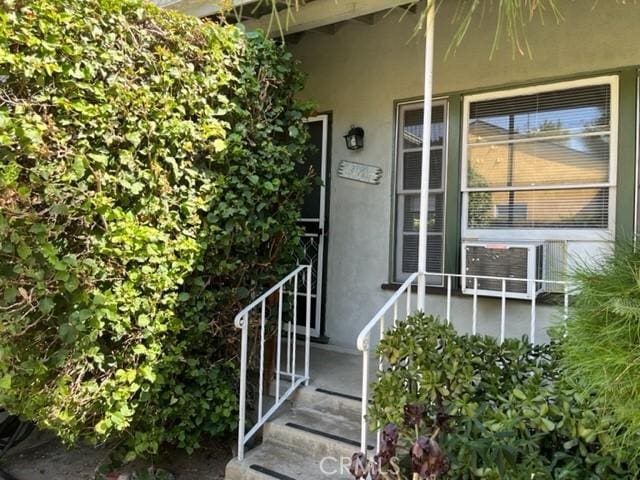10856 Camarillo St, Toluca Lake, CA 91602 - property entrance featuring stucco siding