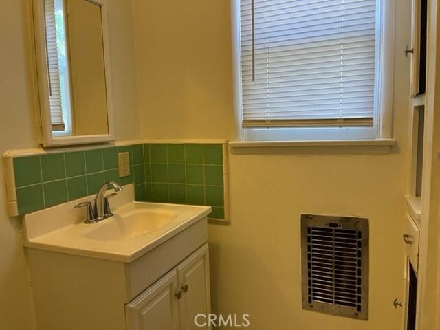 10856 Camarillo St, Toluca Lake, CA 91602 - bathroom with vanity and tile walls