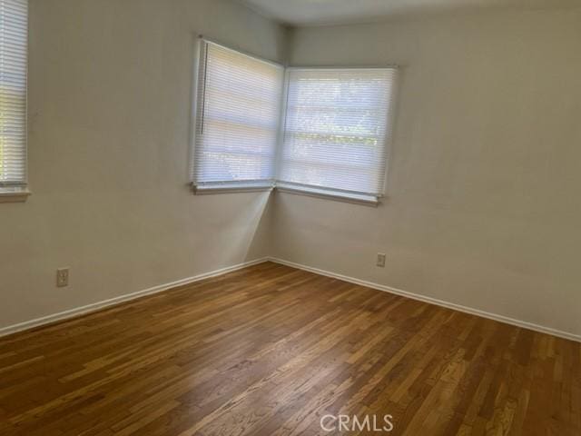 10856 Camarillo St, Toluca Lake, CA 91602 - unfurnished room with wood finished floors and healthy amount of natural light