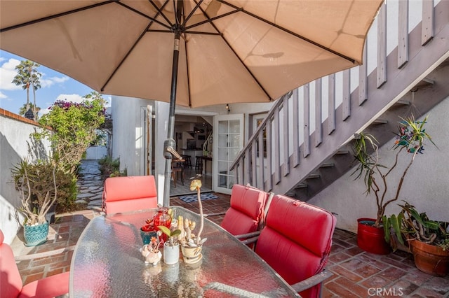 259 62nd, Newport Beach, CA 92663 - view of patio / terrace featuring outdoor dining space and stairway