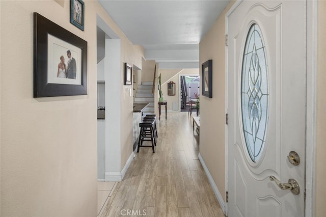 259 62nd, Newport Beach, CA 92663 - entrance foyer featuring light wood finished floors and stairway
