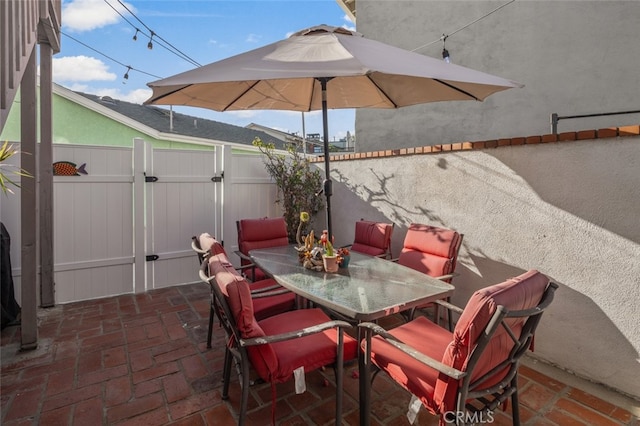 259 62nd, Newport Beach, CA 92663 - view of patio with a gate and outdoor dining area