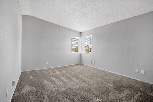 12178 Galaxy St, Victorville, CA 92392 - unfurnished room with carpet flooring, a textured ceiling, and lofted ceiling