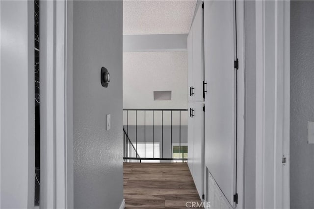 12178 Galaxy St, Victorville, CA 92392 - hall featuring a textured wall and wood finished floors