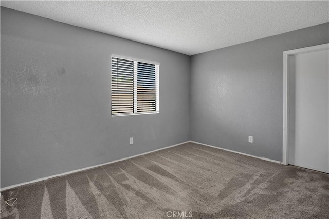 12178 Galaxy St, Victorville, CA 92392 - spare room featuring carpet flooring and a textured ceiling
