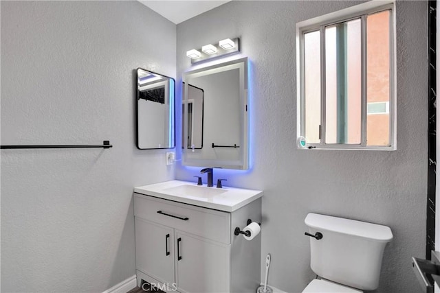 12178 Galaxy St, Victorville, CA 92392 - half bathroom featuring vanity and a textured wall