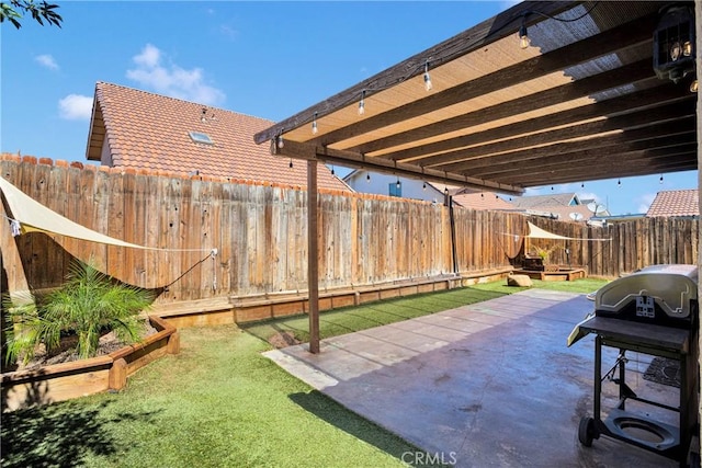 12178 Galaxy St, Victorville, CA 92392 - fenced backyard with a patio area and a grill