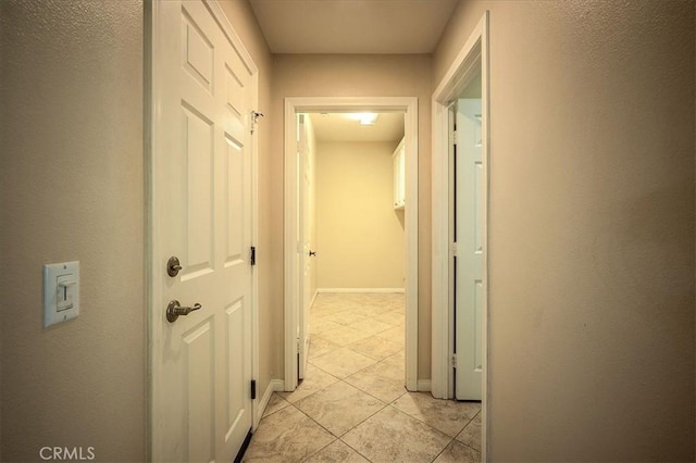 25217 Pacific Crest St, Corona, CA 92883 - hall with light tile patterned flooring and baseboards