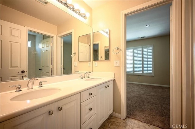 25217 Pacific Crest St, Corona, CA 92883 - bathroom with double vanity and baseboards