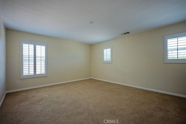 25217 Pacific Crest St, Corona, CA 92883 - spare room featuring baseboards and carpet flooring