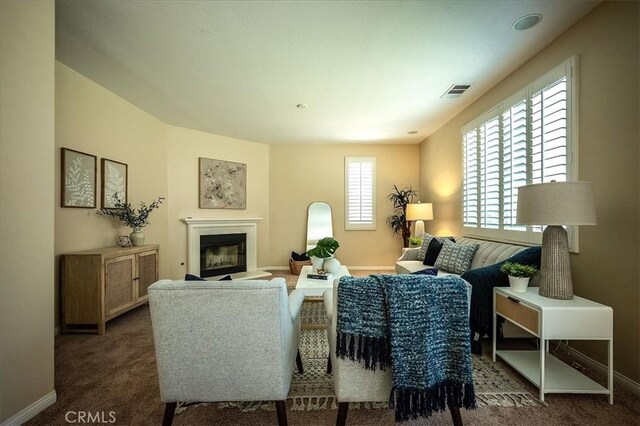 25217 Pacific Crest St, Corona, CA 92883 - living area featuring a glass covered fireplace and carpet floors