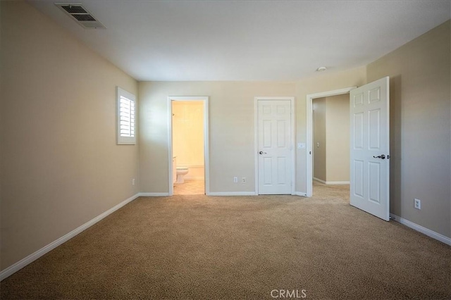25217 Pacific Crest St, Corona, CA 92883 - unfurnished bedroom with carpet flooring and connected bathroom
