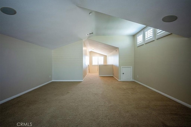 25217 Pacific Crest St, Corona, CA 92883 - bonus room featuring lofted ceiling, plenty of natural light, and carpet flooring