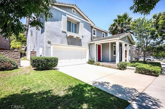 25217 Pacific Crest St, Corona, CA 92883 - traditional-style home with a porch, concrete driveway, stucco siding, an attached garage, and a front lawn