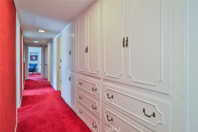 17313 Citronia St, Northridge, CA 91325 - hall with dark colored carpet and a textured ceiling
