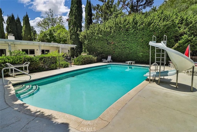 17313 Citronia St, Northridge, CA 91325 - swimming pool with a water slide, a diving board, and a patio area
