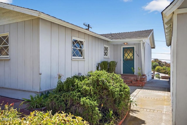 3180 Grove St, Ventura, CA 93003 - view of exterior entry featuring board and batten siding and roof with shingles