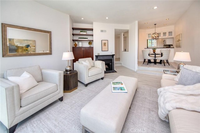 11949 Goshen Ave Unit 308, Los Angeles, CA 90049 - living area featuring a chandelier and recessed lighting