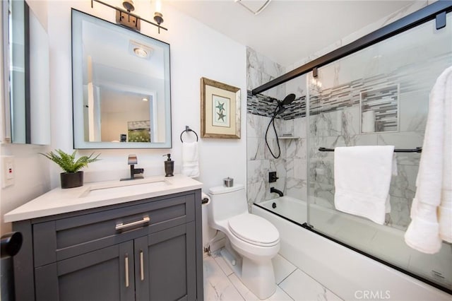 11949 Goshen Ave Unit 308, Los Angeles, CA 90049 - full bathroom featuring vanity, bath / shower combo with glass door, and marble look tiles