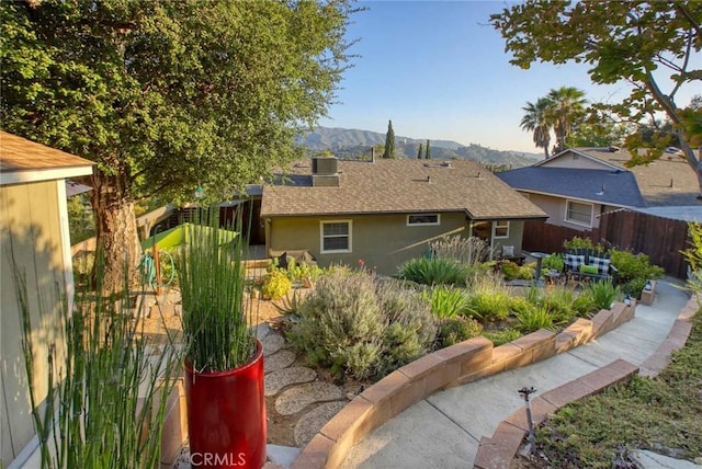 6541 Tokay Rd, Tujunga, CA 91042 - back of house featuring a mountain view and stucco siding