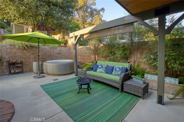 6541 Tokay Rd, Tujunga, CA 91042 - fenced backyard with a hot tub, an outdoor living space, and a patio