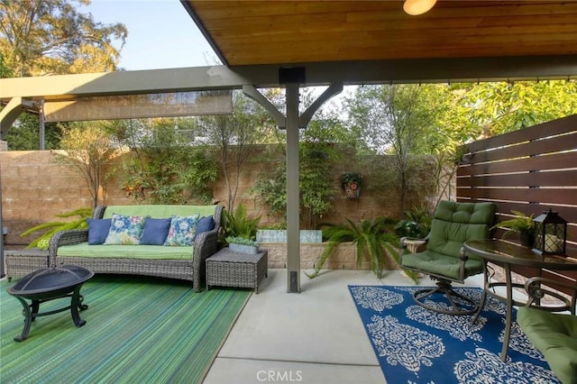6541 Tokay Rd, Tujunga, CA 91042 - fenced backyard featuring an outdoor living space and a patio