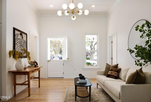 221 N 7th St, Santa Paula, CA 93060 - foyer entrance with light wood finished floors, a chandelier, crown molding, and recessed lighting