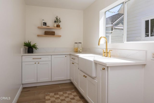 221 N 7th St, Santa Paula, CA 93060 - kitchen with open shelves, white cabinetry, light wood-style flooring, and light countertops