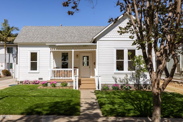 221 N 7th St, Santa Paula, CA 93060 - view of front of house with covered porch, a front lawn, and a shingled roof