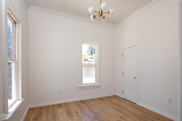 221 N 7th St, Santa Paula, CA 93060 - empty room with a chandelier, crown molding, and light wood finished floors