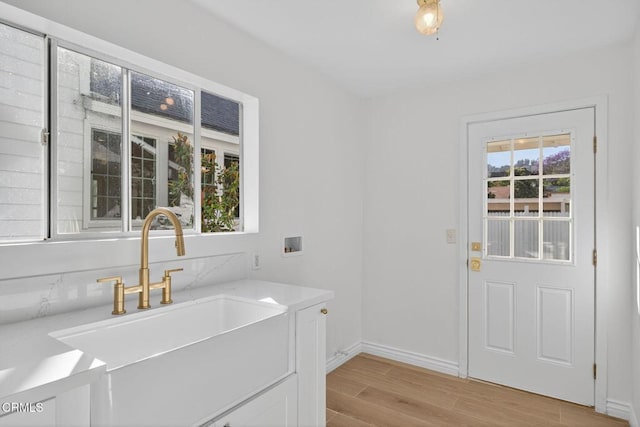 221 N 7th St, Santa Paula, CA 93060 - laundry area featuring light wood-style flooring and washer hookup