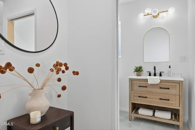 221 N 7th St, Santa Paula, CA 93060 - bathroom featuring vanity and marble finish floors