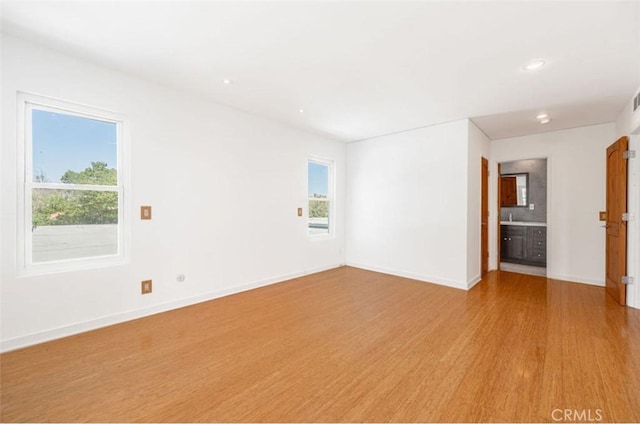 750 S Windsor Blvd Unit 7, Los Angeles, CA 90005 - spare room featuring light wood finished floors and recessed lighting