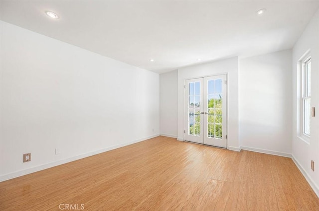750 S Windsor Blvd Unit 7, Los Angeles, CA 90005 - empty room with plenty of natural light, light wood-style floors, and recessed lighting