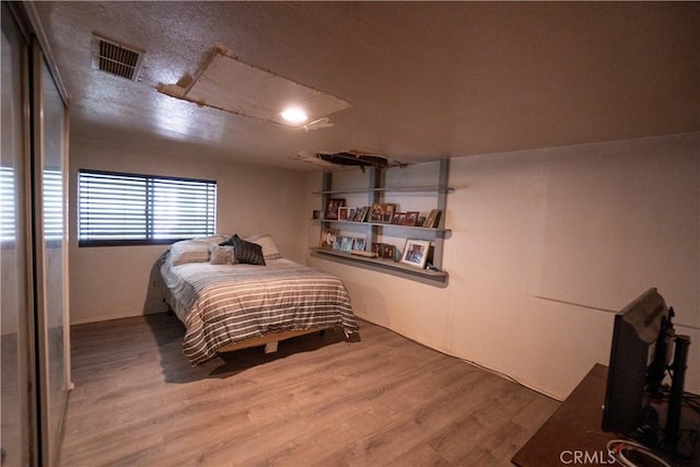22731 Bryman Rd, Oro Grande, CA 92368 - bedroom featuring wood finished floors