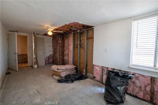 22731 Bryman Rd, Oro Grande, CA 92368 - spare room featuring a textured ceiling and ceiling fan