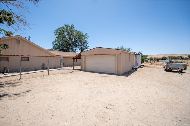 22731 Bryman Rd, Oro Grande, CA 92368 - view of front of property featuring a garage