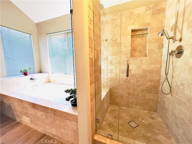 17346 Cold Spring Cir, Riverside, CA 92503 - full bathroom with a bath, a stall shower, and wood finished floors