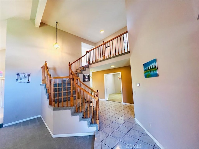17346 Cold Spring Cir, Riverside, CA 92503 - stairs featuring high vaulted ceiling, beam ceiling, and tile patterned flooring