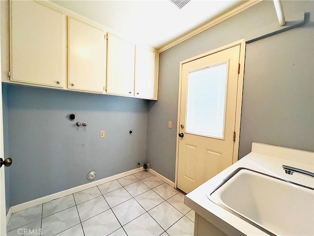 17346 Cold Spring Cir, Riverside, CA 92503 - washroom with cabinet space, hookup for a gas dryer, crown molding, light tile patterned floors, and washer hookup