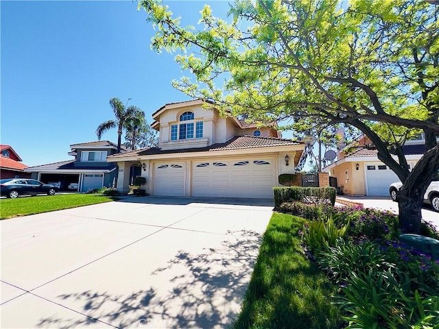 17346 Cold Spring Cir, Riverside, CA 92503 - mediterranean / spanish-style home featuring stucco siding, concrete driveway, an attached garage, and a tile roof