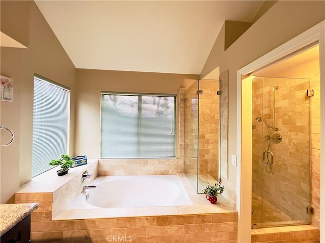 17346 Cold Spring Cir, Riverside, CA 92503 - bathroom featuring lofted ceiling, a bath, a stall shower, and vanity