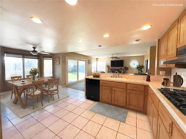 17346 Cold Spring Cir, Riverside, CA 92503 - kitchen with black appliances, ceiling fan, a peninsula, light countertops, and recessed lighting