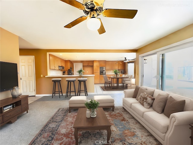 17346 Cold Spring Cir, Riverside, CA 92503 - living area with light colored carpet and a ceiling fan