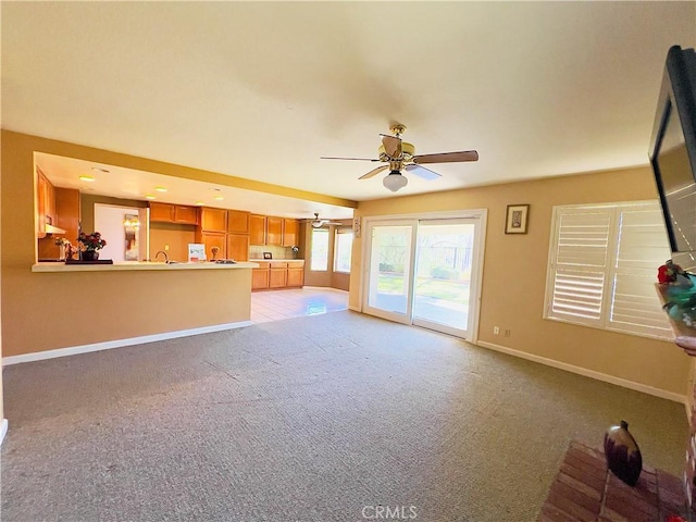 17346 Cold Spring Cir, Riverside, CA 92503 - unfurnished living room featuring light colored carpet and ceiling fan