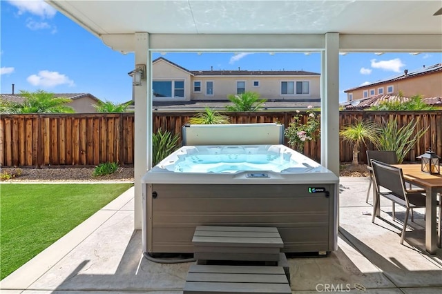 27843 Huron Ct, Menifee, CA 92585 - fenced backyard featuring a patio area and a hot tub